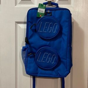 Lego official blue brick backpack with stud pockets and bright yellow interior